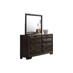 a dresser with a mirror on top of it