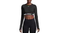 Turn up your workout in this cropped long-sleeve top. Smooth and stretchy fabric works with you through every move and sweat-wicking tech helps you stay dry and comfortable. You can go all out from burpees to pull-ups with thumbholes keeping your sleeves in place. Fit & Design: Nike Dri-FIT technology moves sweat away from your skin for quicker evaporation, helping you stay dry and comfortable Thumbholes let you extend your coverage and help hold the sleeves in place while you move. | Nike Women's Pro 365 Dri-FIT Long-Sleeve Top Black L | Dick's Sporting Goods Cropped Long Sleeve Top, Burpees, Black Xs, Turn Up, Nike Pros, Pull Ups, Stretchy Fabric, Nike Dri Fit, Dri Fit