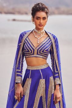 Inky blue organza and satin lehenga with sequins embroidered geometric pattern. Comes with a padded blouse and a net dupatta. - Aza Fashions Blue Silk Choli For Wedding, Blue Silk Wedding Choli, Blue Organza Choli For Eid, Blue Organza Choli With Cutdana, Blue Organza Sets In Traditional Drape, Blue Organza Choli For Diwali, Blue Organza Sets With Traditional Drape, Blue Bollywood Organza Sets, Blue Fitted Organza Lehenga