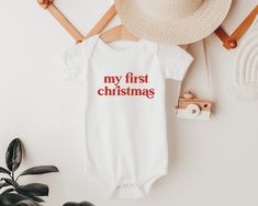 🎄🎄 Xmas deadlines: Place your order by Dec 11 for the best chance of receiving it in time for Xmas 🎄🎄 🎄🎄 DEADLINES FOR XMAS: December 12th. Please be patient if you order after this date. Postal services get super busy during the holiday period, so delays are expected during this time 🎄🎄 My First Christmas baby bodysuit This super soft 100% cotton bodysuit is a perfect gift for a little cutie, a pregnancy announcement, or a gorgeous gift for a new Mama. The Details: * Super soft and comfy!  * Lightweight and breathable * 100% cotton for the softest feel imaginable * The design is printed directly on the garment, no vinyl or stencils - which means it will last through many washes * Size details in photos. If you're not sure on size, I always recommend ordering a size up! Kids can al Locally Grown Onesie, Feminist Baby, Cute Family Photos, New Mama, Retro Baby, Mama Tee, Family Tees, Moms Club, Tiny Dancer