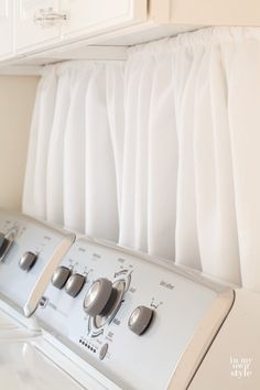 a white washer and dryer sitting next to each other