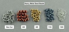 several metal seed beads are shown in different colors and sizes on a gray surface, with the words heavy metal seed beads below them