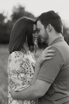 black and white photo of couple embracing each other