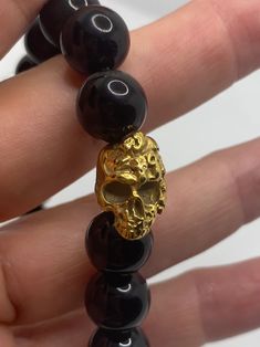 Vintage Style Black Onyx Unisex Mens Stretch Golden Skull | Etsy Black Skull Bracelets For Streetwear, Gold Adjustable Skull Bracelets, Adjustable Gold Skull Bracelets, Prayer Bead Bracelet, Indie Art, Skull Bracelet, Cool Vintage, Prayer Beads, Beads Bracelet