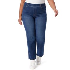 a woman in white shirt and blue jeans