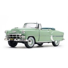 an old fashioned green car is shown on a white background with the hood up and wheels down