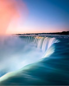 an image of the niagara falls at sunset