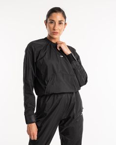 Developed with Boxing's Elite, the Hagler Sauna Suit 2.0 is the perfected weight cutting tool chosen by World Champions. Optimised for the female form, the Sauna Suit 2.0 top sits at a flattering length with high waisted bottoms that offer more room to manoeuvre around the hips. Re-engineered with a lighter, more durable fabric to maximise training benefits, assuring optimal heat retention, improved range of motion and reduced risk of injury. The Hagler Sauna Suit 2.0 has been proven to raise bl Lifestyle Club, Shell Suit, Sauna Suit, High Waisted Bottoms, Sweat Suit, Training Clothes, Hip Hop Streetwear, High Waist Bottoms, Kangaroo Pouch