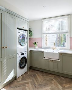 a washer and dryer in a small kitchen