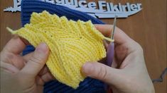 someone is crocheting the stitches on a knitted object