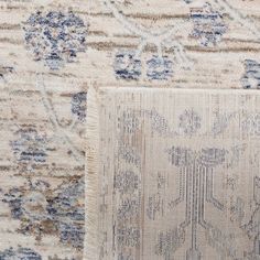 two rugs with different patterns on them, one is beige and the other is blue