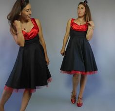 We combine shipping! FREE shipping price for each additional item!11Vintage swing 90's does 50's dress. Made of black mixed fabric. Skirt is full and flared with lining that ending with red tulle. Side zip. Sleeveless, it has red bombshell top, knee length. Small sizeMaterial: cotton/syntheticSize: UK 8 EU 36 USA 4✂------m e a s u r e m e n t s--------------8Measurement Bust and waist already doubled.Bust: 33,5" 85 cmWaist: 25'' 64 cmHips: freeLength: 38,5" 98 cmEvery items at PaperMoonDress has 1950s Style Black Dress For Retro-themed Events, Black 1950s Style Dress For Retro Events, Black Retro Style Dress For Retro-themed Events, Black Rockabilly Dress For Retro-themed Events, Red Pinup Dress For Party, Red Pinup Party Dress, Mode Rockabilly, Red Black Dress, Fabric Skirt