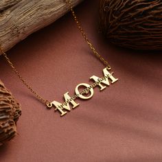 Mom Necklace,Solid Gold Nameplate Necklace,Necklace For Mothers Day,10k 14k 18k Real Gold Mom Necklace For Christmas,Necklace For Women This necklace is handmade and produced with 10k 14k 18k solid gold according to your preference. Our gold color options: Yellow Gold,White Gold, Rose Gold Pendant Sizes: height: 0.35 inches (9mm) width: 1.38 inches (35mm) We have 3 Types solid gold chain options: Type1 Chain (0.85mm thick) Type2 Chain (0.97mm thick) Type3 Chain (1.30mm thick) We use lobster claps on our chains. Chain length: 14 inches adjustable 13 inches 16 inches adjustable 15 inches 18 inches adjustable 17 inches 20 inches adjustable 19 inches 22 inches adjustable 21 inches The necklace is made to order. We make it ready for shipment within 3 business days.  Please contact us using the Gold Nameplate Necklace, Nameplate Necklace Gold, Mama Necklace, Christmas Necklace, Nameplate Necklace, Solid Gold Chains, Rose Gold Pendant, Mom Necklace, Necklace Necklace