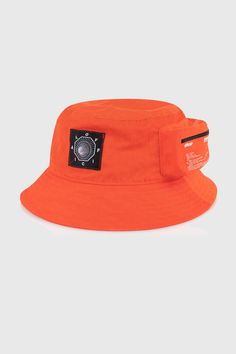 Official presents the Bio-Tracker Cargo Bucket Hat Features: Orange distressed nylon Drawstring with cinch adjuster Zippable cargo pouch on left side Woven patch front logo and screen printed graphic on cargo pouch Moisture Wicking Comfort Designed Cotton Sweatband Cheap Flat Bill Hats For Gifts, Cheap Orange Baseball Cap With Flat Bill, Cheap Orange Trucker Hat For Outdoor, Cheap Orange Snapback Hat For Streetwear, Bucket Hat Ideas, Custom Bucket Hats, Kangol Hats, Headwear Fashion, Bucket Hat Summer