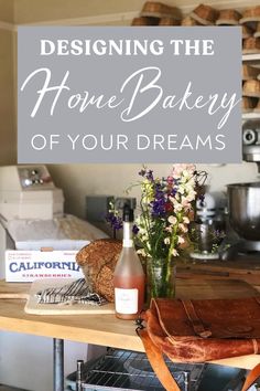 a table with bread and flowers on it in front of a sign that says designing the home bakery of your dreams