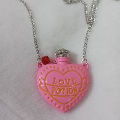 Pink Heart Love Potion Necklace Cute Silver Charm Necklace For Valentine's Day, Cute Silver Heart Necklace For Valentine's Day, Potion Necklace, Kendra Scott Necklace Elisa, Cross Choker Necklace, Cross Choker, Love Potion, Initial Necklace Gold, Locket Charms