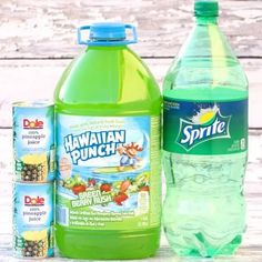 a bottle of sprite hawaiian punch next to two cans of sprite juice