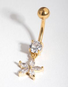 a gold plated belly ring with clear stones