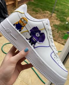 Hey my name is Ell and welcome to my page! Hand painted Minion inspired design with a yellow and purple stitching detail. Each pair of trainers is hand painted with care. Trainers are brand new and ready for customisation.  I offer a selection of other designs, head on to my page to see what else I have to offer. Have another idea, drop me a message and we can design your dream pair of shoes together.  Average 2-3 week delivery process but drop me a message for priority postage! Happy shopping! Hand Painted Yellow Sneakers For Streetwear, Custom Hand Painted Yellow Sneakers, Yellow Sneakers With Custom Artwork And Round Toe, Yellow Low-top Sneakers With Custom Artwork, Hand Painted Purple Sneakers With Round Toe, Yellow Customizable Casual Sneakers, Yellow Casual Custom Artwork Sneakers, Casual Yellow Custom Artwork Sneakers, Casual Yellow Customizable Sneakers