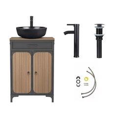 a bathroom vanity with sink and faucet next to it's black accessories