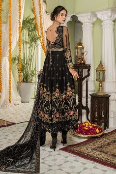 Trendy Black Pakistani Dress with Embroidery is a modish Pakistani Dress with breathtaking adornments on it rendering it unmatched in its grace and beauty. Fine golden details and beautiful embroidery work on this dress are making it perfect to style if you are looking for Pakistani Wedding Dresses. Lehenga: This Black Pakistani Dress comes with a spectacular lehenga in the premium quality net. This lehenga is decorated with floral embroidery work and magnificent golden details. Heavy embellishm Bridal Dresses 2022, Dresses Lehenga, Black Pakistani Dress, Pakistani Lehenga, Asian Designers, Dress Name, Dress With Embroidery, Dresses 2022, Pakistani Salwar Kameez