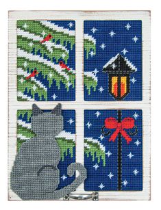 four cross stitch coasters with cats and christmas trees on them, all in different colors