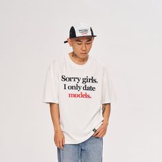 The "Sorry Girls I Only Date Models" Slogan T-Shirt is a playful and bold fashion statement that has taken the internet by storm. It’s a piece that you might have seen before, thanks to its viral popularity. Created by the designer brand WCC, known for its innovative and trend-setting designs, this T-shirt has become iconic and widely imitated over the years. The slogan on the front adds a touch of humor and rebellious spirit to the garment. The T-shirt features a slightly oversized silhouette, The Sorry Girls, Slogan T Shirt, Current Fashion Trends, Oversized Silhouette, Bold Fashion, Male Model, Fashion Statement, Over The Years, The Internet