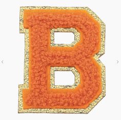 the letter b is made up of orange flowers