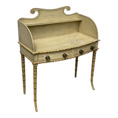 an antique writing desk with drawers is shown