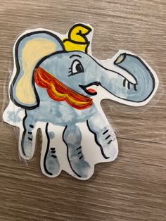 an elephant sticker with a crown on its head