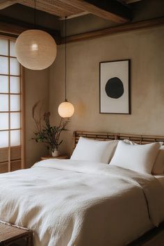 Minimalist Japandi bedroom with neutral colors, soft lighting, and abstract artwork above bed