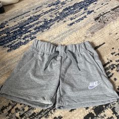 Kids Medium Grey Nike Shorts. Fits A Size Xs Is Woman’s. Brand New With Tags Never Worn. Any Questions Feel Free To Leave A Comment. Open To Offers! Sporty Cotton Shorts For Playwear, Nike Sporty Shorts For Playwear, Sporty Nike Shorts For Playwear, Cotton Sportswear Shorts For Playwear, Sporty Bottoms With Pockets For Playwear, Sporty Playwear Bottoms With Pockets, Nike Cotton Shorts For Playwear, Nike Bottoms For Playwear In Short Style, Casual Gray Nike Shorts