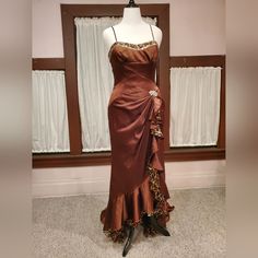 My Gowns Are Not Pre Owned. They Have Not Been Worn, Or Altered. This Gorgeous Chocolate Brown Is So Rich And Pretty. This Gown Has A Little Leopard Print Lining Peeking Out! It's Both Sophisticated And Fun. The Optional Modesty Panel Can Be Worn Beneath The Laces. Size 14 Measures: Bust 39.5"-40.5" Waist 33"-34" Hips 40" The Lace Up Back Allows You To Loosen Or Tighten The Bust And Waist A Little. Make Sure The Hip Measurement Is Accurate. It Has The Designer Hangtag And All Inside Labels Are I Glamorous Fitted Satin Mother Of The Bride Dress, Glamorous Fitted Ball Gown For Mother Of The Bride, Brown Floor-length Wedding Dress, Fitted Satin Ball Gown Evening Dress, Brown Fitted Evening Dress, Fitted Satin Floor-length Mother Of The Bride Dress, Fitted Silk Ball Gown, Fitted Sleeveless Satin Mother Of The Bride Dress, Fitted Satin Gown For Formal Occasions