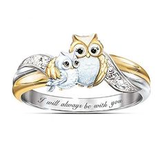 an engraved ring with two owls sitting on it's sides and the words i will always