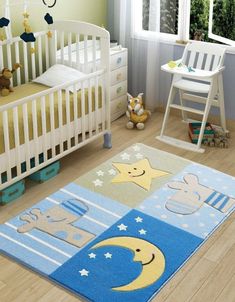 a child's room with a rug and crib