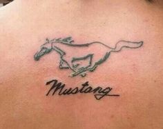 a horse tattoo with the word mustang on it