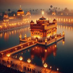 an aerial view of the golden temple in india at night with people standing around it