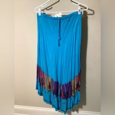 Turquoise With Tie Dye Different Colors Around The Bottom, Scalloped Hem And Embroidered Flowers And Designs On The Bottom. Higher On Sides Maxi In Front And Back. Fall Clothes, Embroidered Skirt, Scalloped Hem, Embroidered Flowers, Free Size, High Low, Fall Outfits, Elastic Waist, Blue Green