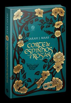 a book with gold flowers on it and the title's cover in spanish language