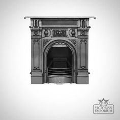 an antique fireplace with ornate carvings and columns