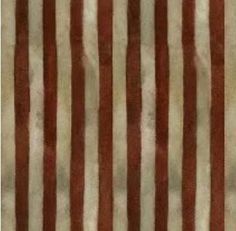 a striped rug is shown with brown and white stripes on the top, and bottom