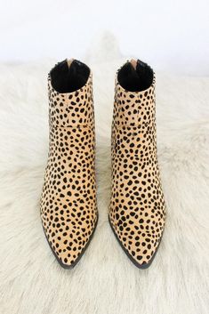 Every gal needs that one go-to bootie in their closet and these are just that. Featuring a pointed toe, block heel, back zipper for easy slip-on, and overall leopard leatherette detailing. Details Material: Man-made, leopard suede leatherette Sole: Synthetic Animal print detailing Measurement: Heel Height: 3" (approx.) Runs true to size FINAL SALE: Cannot be exchanged or returned Cheetah Boots, Cheetah Shoes, Dolce Vita Boots, Leopard Boots, Leopard Shoes, Dolce Vita Shoes, Suede Shoes, Suede Boots, Bootie