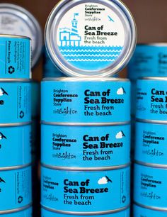 several cans of sea breeze are stacked on top of each other with the labels below them