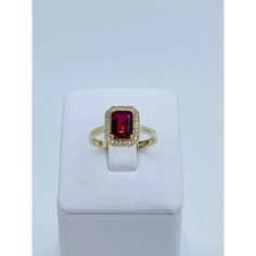 🌟 RED ❤️ Real 10k Solid Gold Women's Ring ❤️ New jewelry ❤️ Size 7.5 ❤️ White & red Cubic Zirconia ❤️ Includes a small box ❤️ July (Ruby Birthstone) Check out my other jewelry ❤️ Anillo de 10k de oro sólido ❤️ Joyeria Nueva ❤️ Zirconia Blanca y roja color diamante y ruby de el mes de Julio ❤️ Tamaño 7.5 para Mujer Stock 51753 🥂 CHAMPAGNE Emerald Cut ❤️ 10k solid gold women's ring CZ ❤️ Size 8 ❤️ Stone is a light champagne topaz gold color emerald cut Approx 9mm surrounded by white cubic zircon Gold Ruby Cluster Ring With Halo Design, Gold Ruby Cluster Ring With Halo Setting, Fine Jewelry Red Diamond Ring Stamped 14k, Yellow Gold Ring With Lab-created Ruby In Halo Setting, Gold Ruby Jewelry For Proposal, Gold Rings With Prong Setting And Lab-created Ruby, Fine Jewelry Red Rings Stamped 14k, Red 14k Gold Cluster Ring, Gold Birthstone Ring With Center Lab-created Ruby