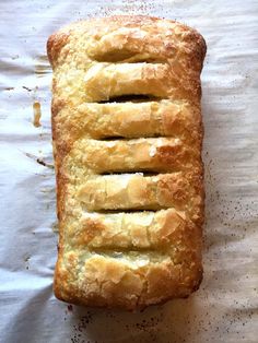 a loaf of bread with four slices cut out