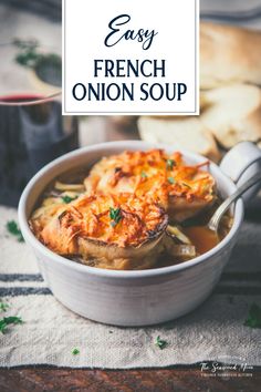 an easy french onion soup in a white bowl