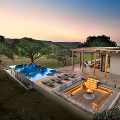 an aerial view of a house with a swimming pool