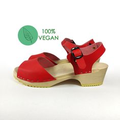 MADE FROM  LEATHER AND ALDER WOOD If you are looking for other colors - please send us message Clogs for Women LUNA Low heals ergonomic wooden sole and Vegan leather. peep toe clogs made to order. Available in sizes 36-41. For other sizes please contact me EUR 35 l UK 2.5 l AUS 4.5 l USA 5 l up to 22.3cm l 8.78 inches  EUR 36 l UK 3.5 l AUS 5.5 l USA 6 l up to 23cm l 9.02 inches EUR 37 l UK 4 l AUS 6 l USA 6.5 l up to 23.7cm l 9.33 inches  EUR 38 l UK 5 l AUS 7 l USA 7.5 l up to 24.5cm l 9.65 inches EUR 39 l UK 6 l AUS 8 l USA 8.5 l up to 25.3cm l 9.96 inches EUR 40 l UK 7 l AUS 9 l USA 9 l up to 25.9cm l 10.2 inches EUR 41 l UK 7.5 l AUS 9.5 l USA 9.5 l up to 26.6cm l 10.47 inches EUR 42 l UK 8 l AUS 10 l USA 10.5 l up to 27.2cm l 10.69 inches Hand crafted women's clogs are made using VEG Red Slingback Sandals With Buckle Closure And Round Toe, Red Slingback Sandals With Buckle Closure, Rubber Sole Slingback Clogs, Spring Open Toe Clogs With Leather Sole, Summer Slingback Clogs With Rubber Sole, Summer High Heel Clogs With Rubber Sole, Spring Block Heel Sandals With Rubber Sole, Open Toe Heels With Rubber Sole, Spring Open Toe Clogs With Rubber Sole