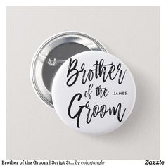 a white button with the words father of the groom printed in black ink on it