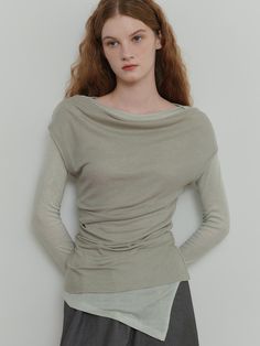 Composition : Wool 10% / Tencel 90%Color : Khaki/Light GreenCountry of Origin : Republic of Korea Modern Green Tops For Fall, Modern Green Top For Fall, Modern Green Fall Tops, Chic Fine Knit Blouse For Layering, Spring Viscose Knit Top For Layering, Elegant Green Tops For Layering, Fine Knit Tops For Spring Layering, Versatile Fine Knit Spring Top, Versatile Fine Knit Top For Spring